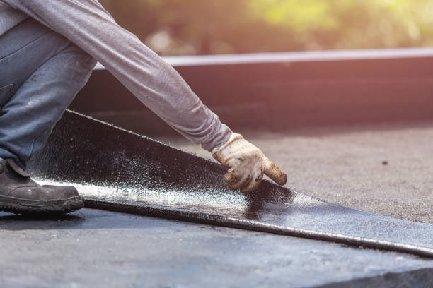 Professional Waterproofing technician working in Lexington, WA
